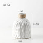 White textured vase with twine on a light gray background, showing measurements.