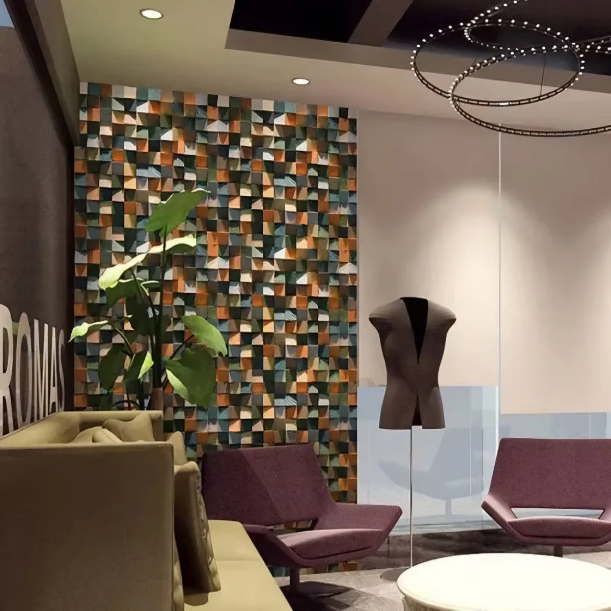 Modern interior design with patterned wall, chairs, and a plant.