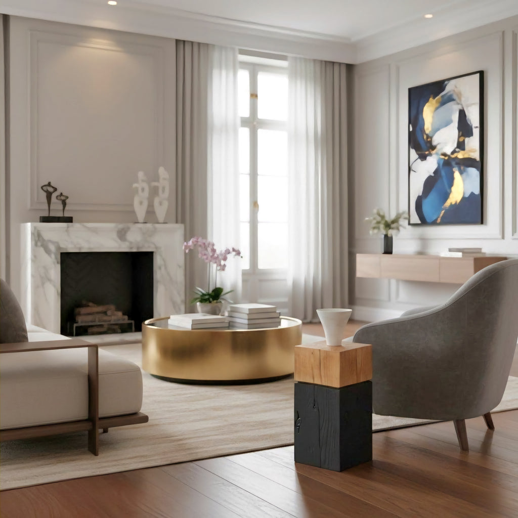 Modern living room with marble fireplace, gold coffee table, and abstract art.