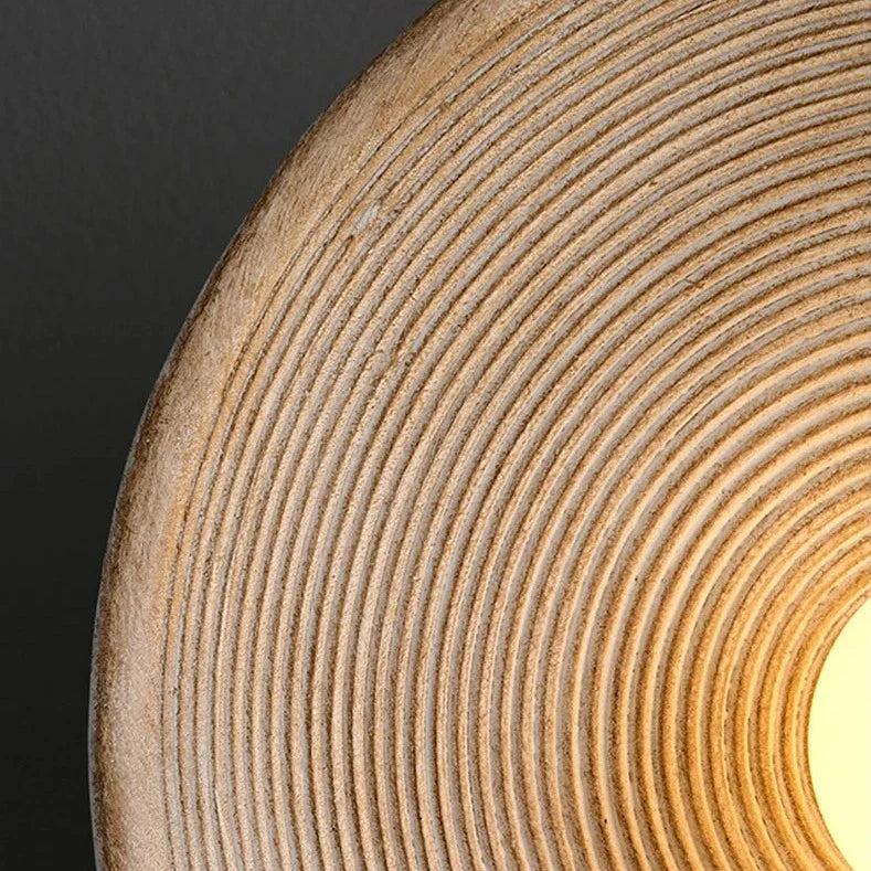 Close-up of a wooden surface with concentric circular patterns
