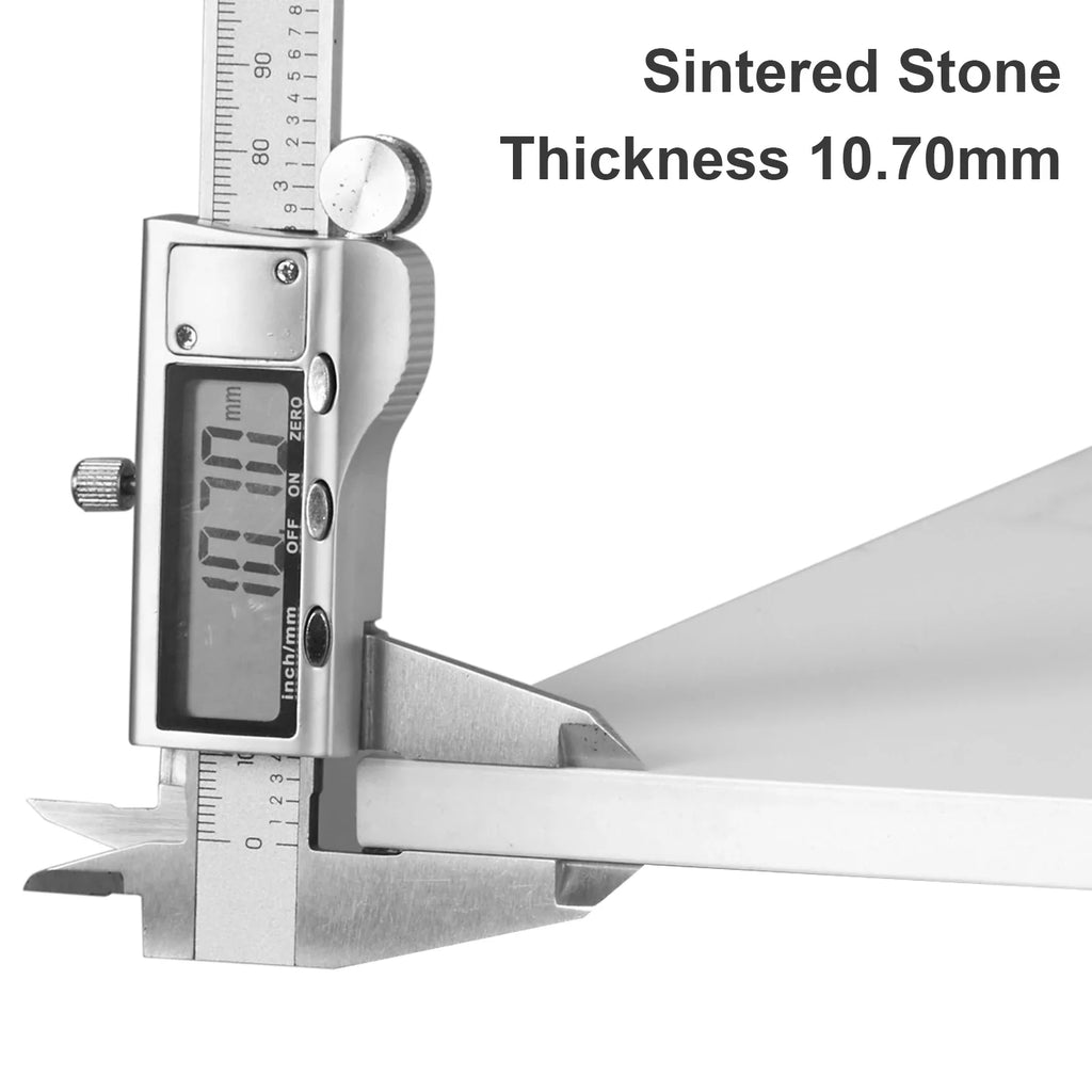 Digital caliper measuring sintered stone thickness with a value of 10.70mm.
