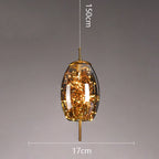 Pendant light with decorative glass shade and measurement details on a gray background
