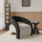 Modern black and white chair in a room with wooden paneling and decorative elements.