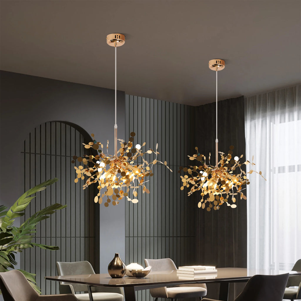 Two modern chandeliers hanging above a dining table in a stylish room with a dark wall and window.