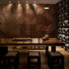 Wooden interior with geometric wall design and a table setup.