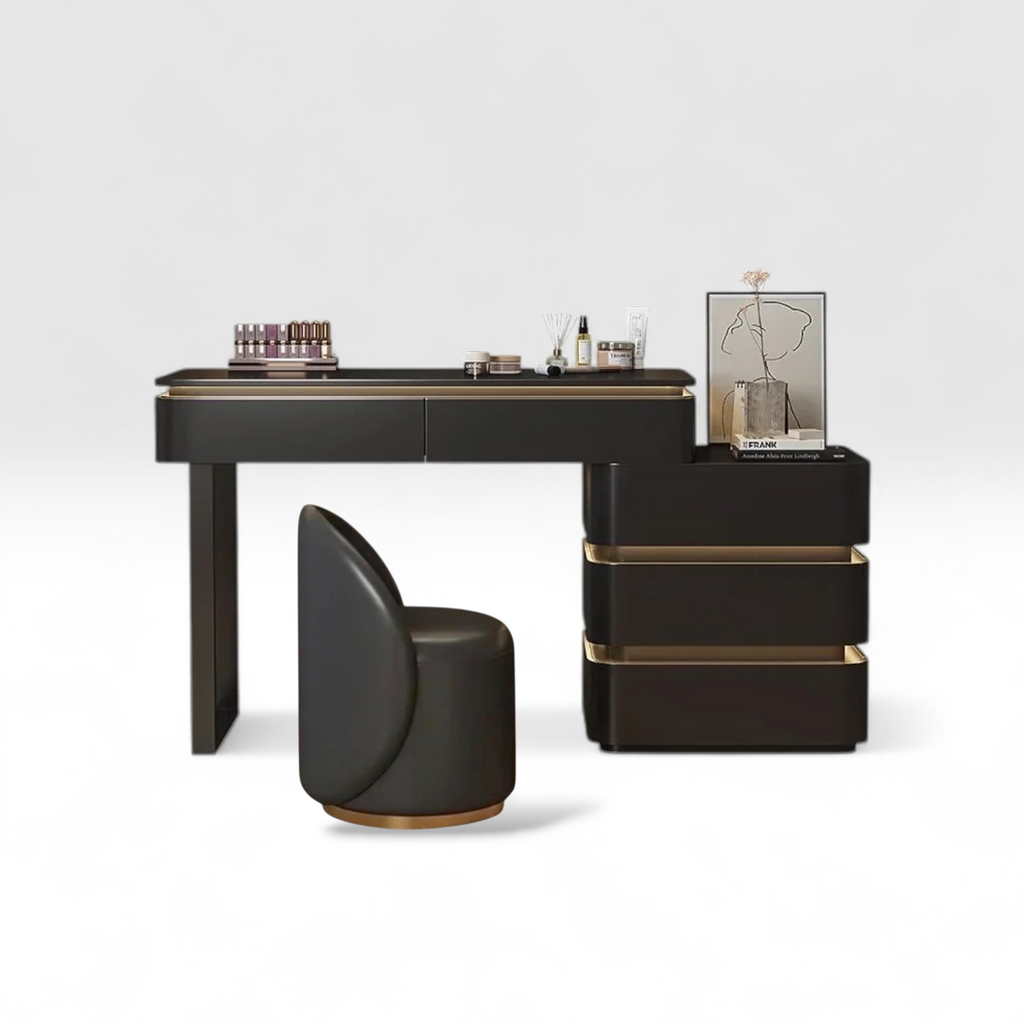 Black and gold desk with chair and decorative items on a white background