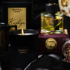 Shifa Aromas candles and diffuser with decorative elements on a dark background