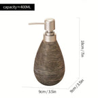 Brown textured soap dispenser with silver pump, dimensions shown on a white background