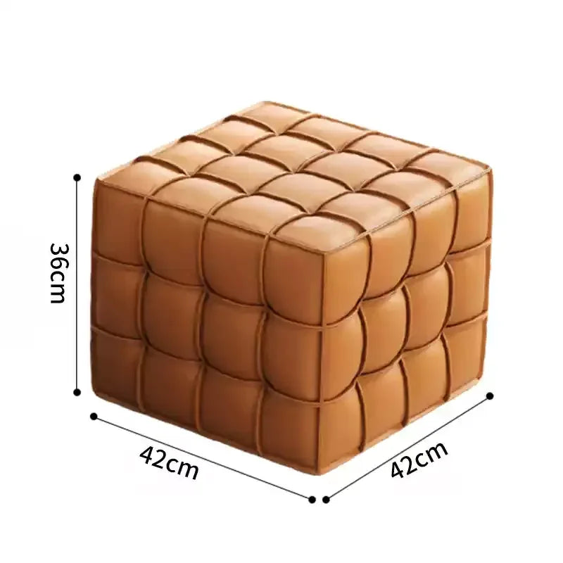 Brown woven cube ottoman with dimensions on a white background