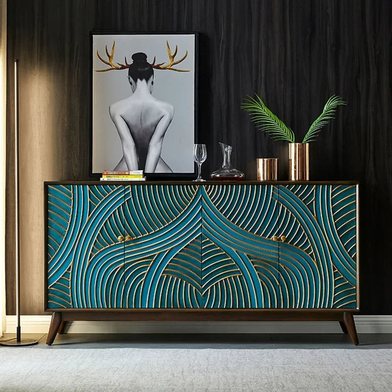 Decorative sideboard with teal and gold pattern in a room setting.