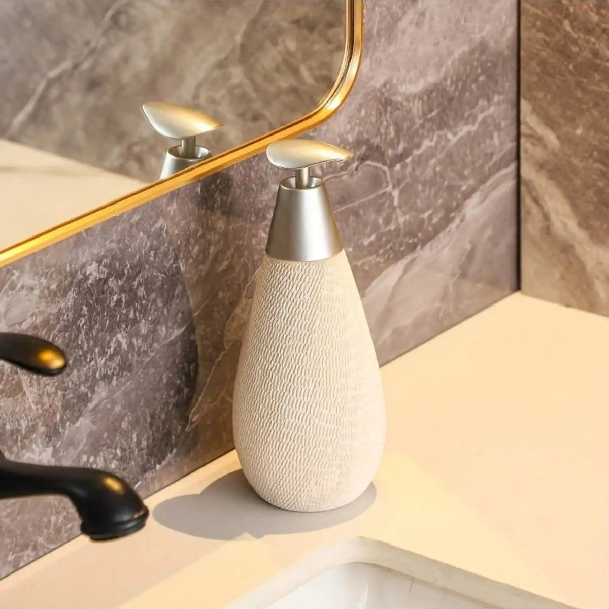 White textured soap dispenser on a bathroom counter with a mirror in the background.