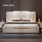 Cream white bed with gold accents in a bedroom setting