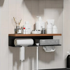 Bathroom shelf with various toiletries against a tiled wall