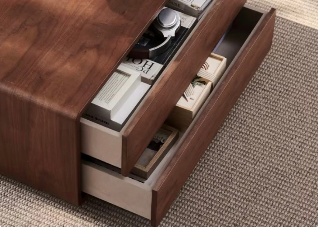 Wooden drawer with compartments on a carpeted floor