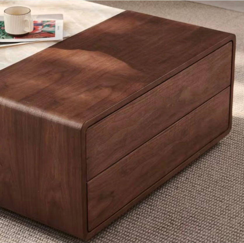 Wooden ottoman on a carpeted floor with a cup and magazine in the background.