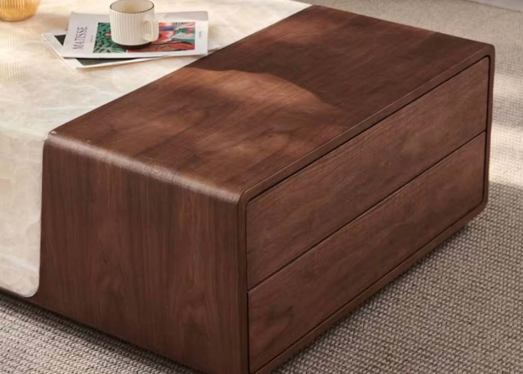 Wooden coffee table with storage drawers on a carpeted floor.