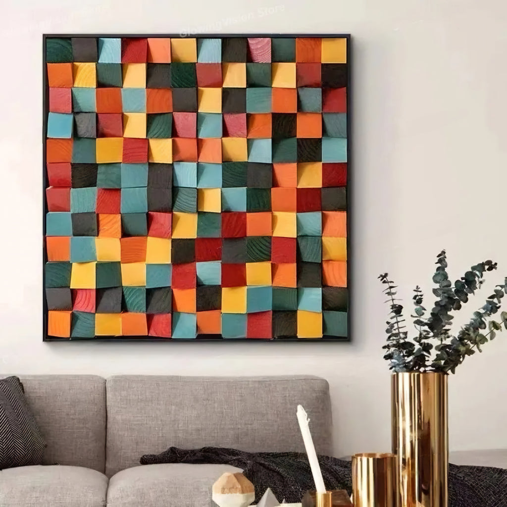 Colorful geometric wall art above a gray sofa in a living room.