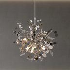 Chandelier with metallic leaves on a gray background