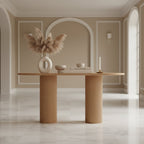 Modern dining table with decorative elements in a minimalistic room.