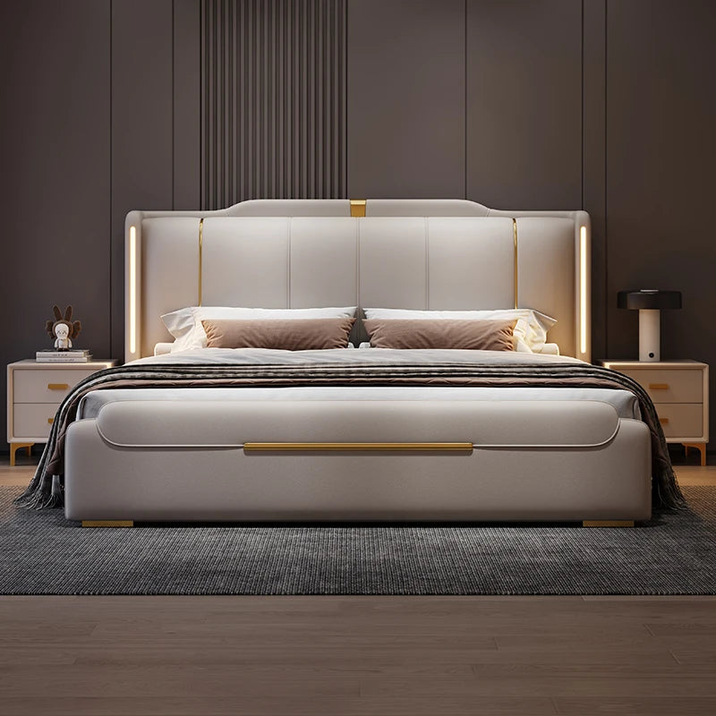 Modern bedroom with a beige upholstered bed, nightstands, and decorative items.