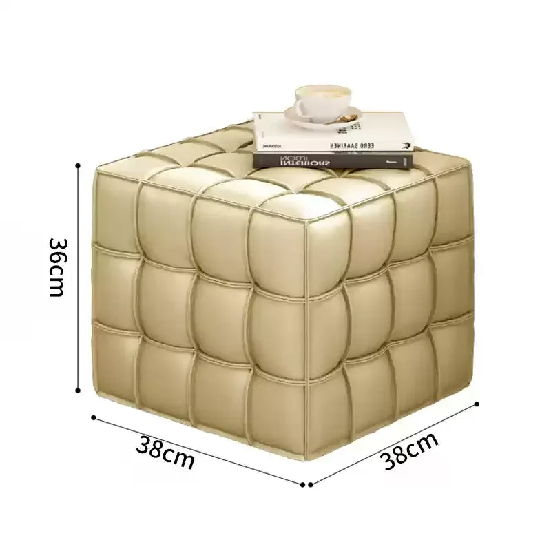 Beige cube-shaped ottoman with dimensions labeled on a white background