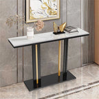 Console table with marble top and gold accents against a gray wall.