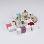 Collection of Shifa perfume bottles and boxes on a white background