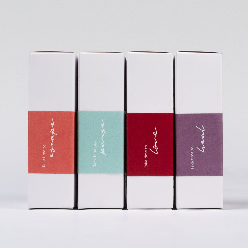 Four white boxes with colorful labels on a light gray background