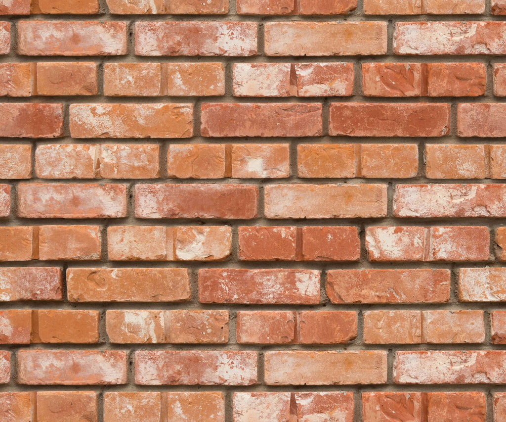 Pattern of red bricks wallpaper with a slight variation in colour