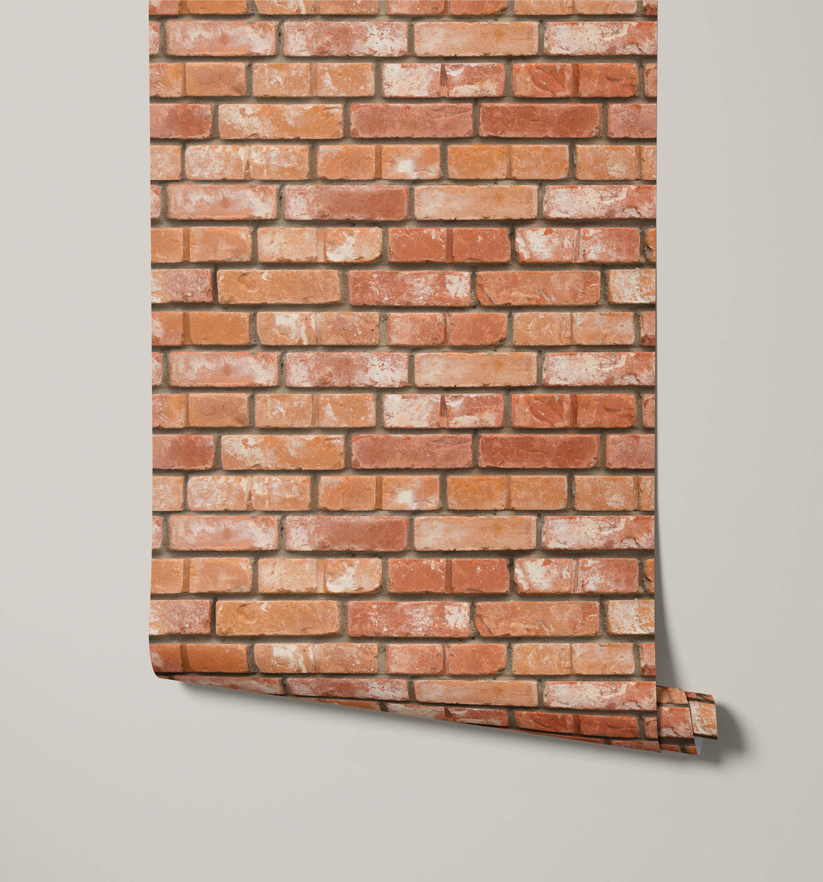 Roll of brick-patterned wallpaper on a plain background