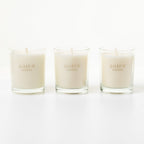 Three Shifra candles on a white background