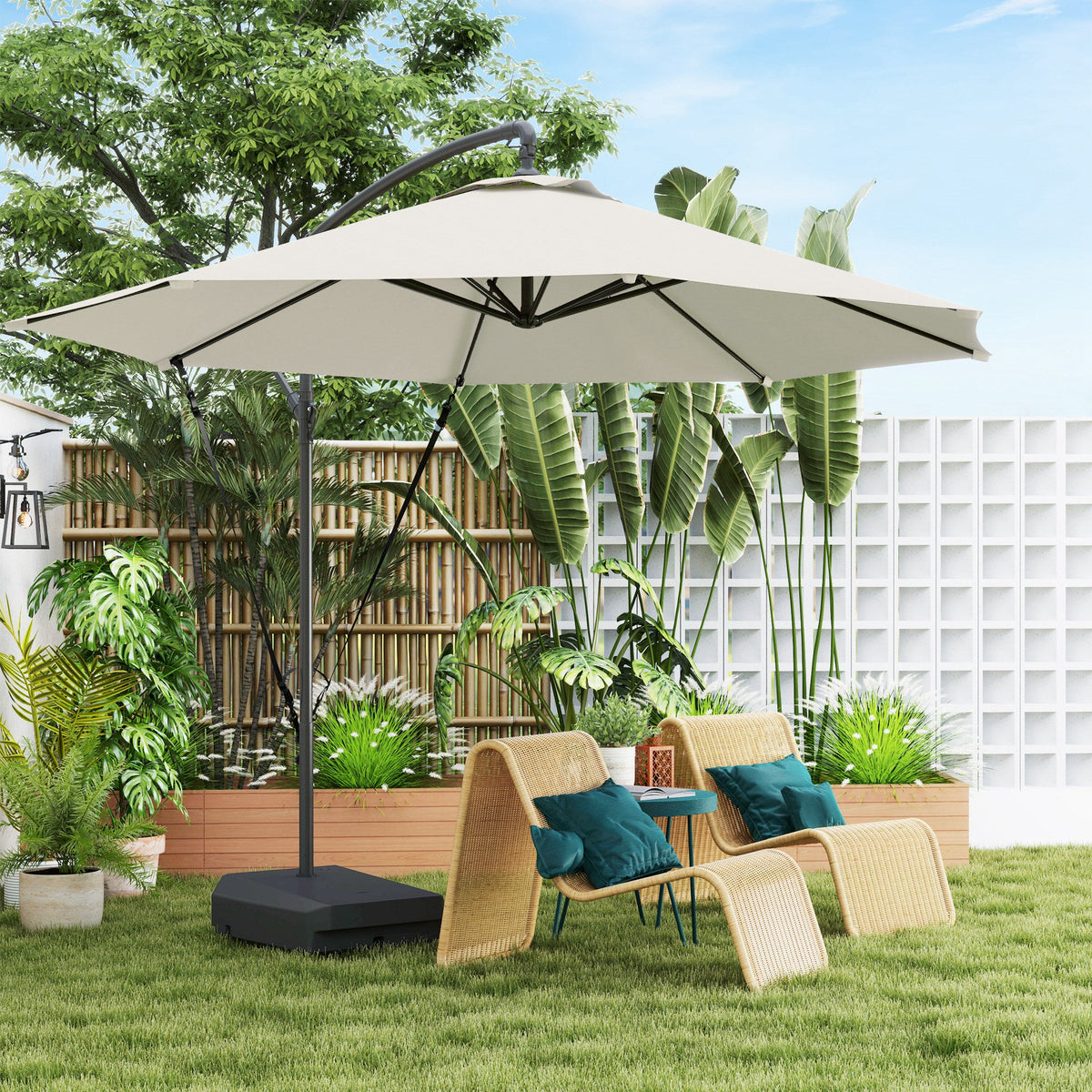 Beige patio umbrella with stand in a garden setting with chairs and plants.
