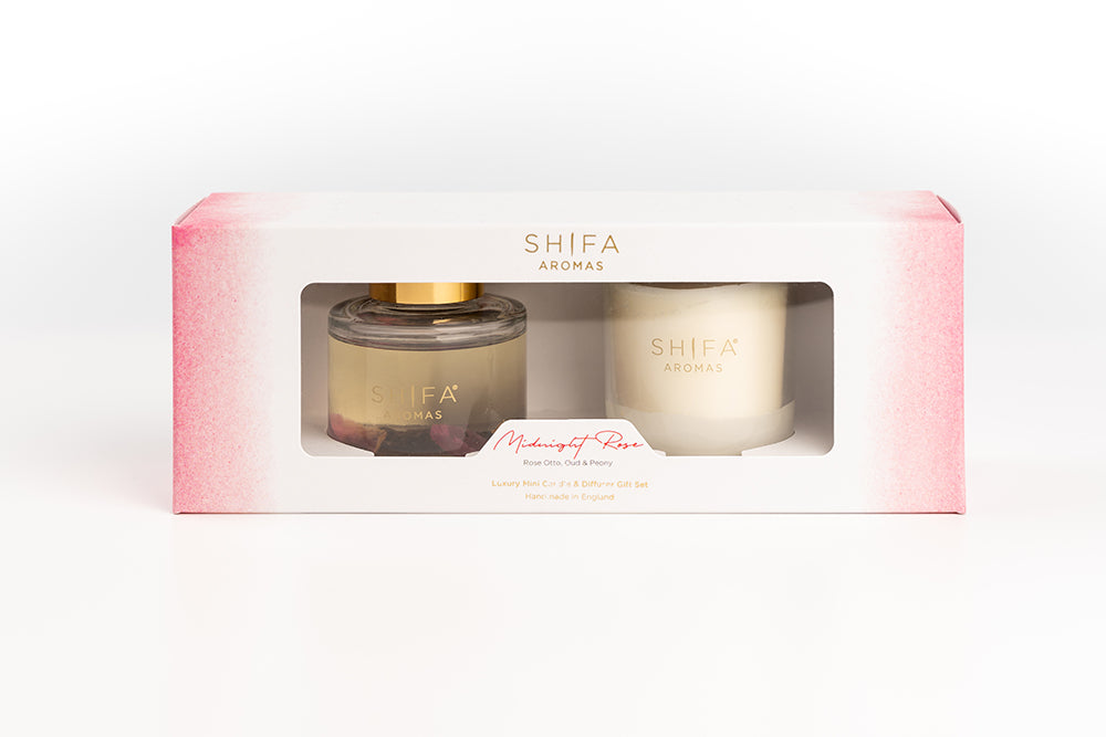 Shifa Aromas candle set in a pink box on a white background