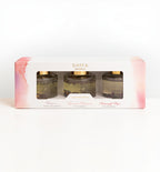 Set of Shifa Aromas candles in a decorative box on a white background