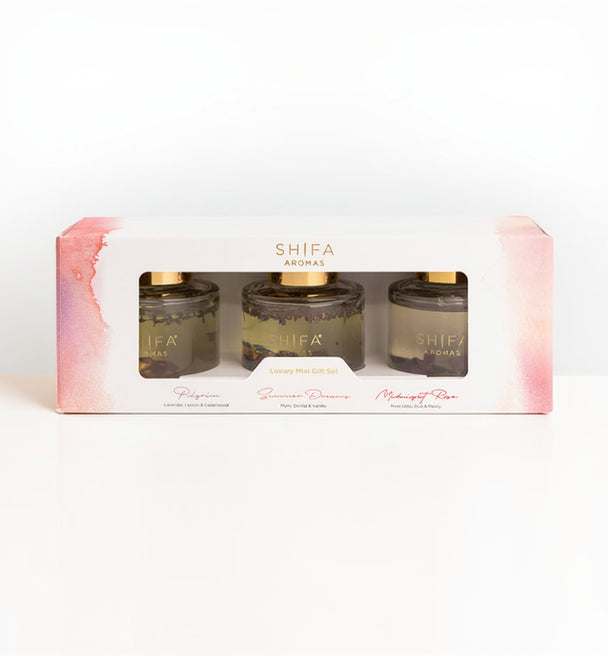 Set of Shifa Aromas candles in a decorative box on a white background