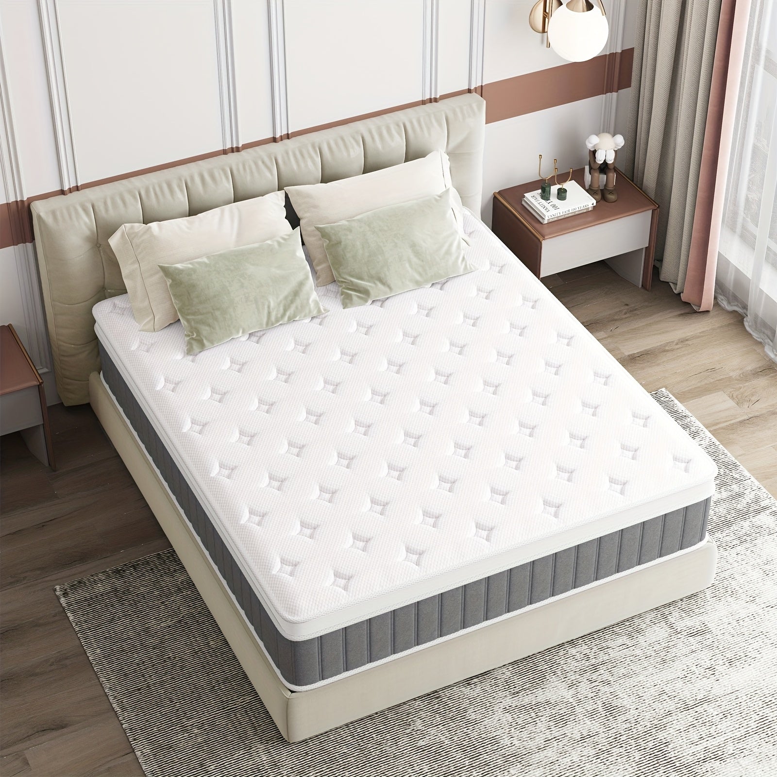 Mattress on a bed in a bedroom setting with pillows and a nightstand.
