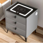 Gray nightstand with LED light and wireless charging pad on a wooden floor.