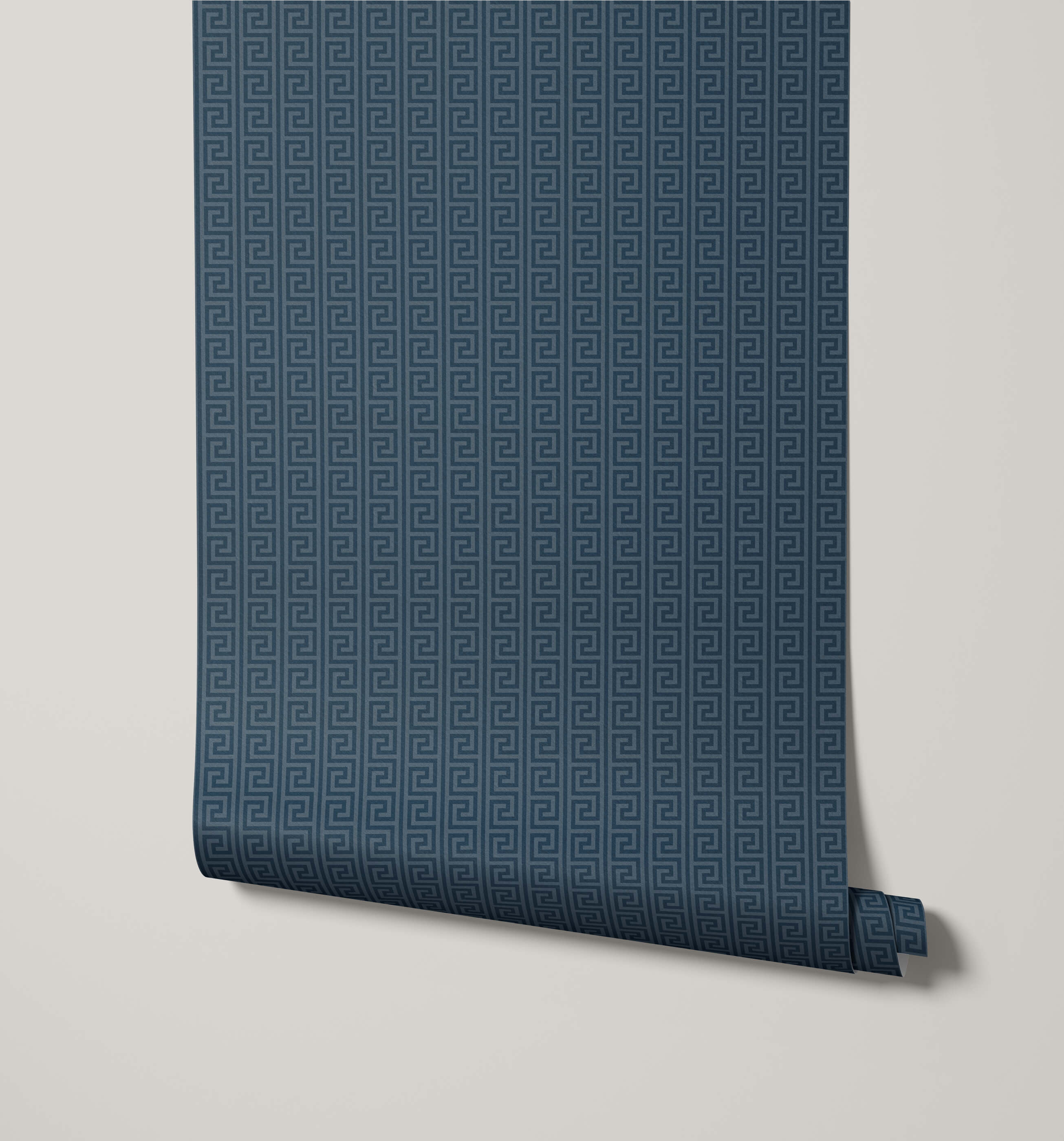 Roll of blue patterned wallpaper on a light gray background