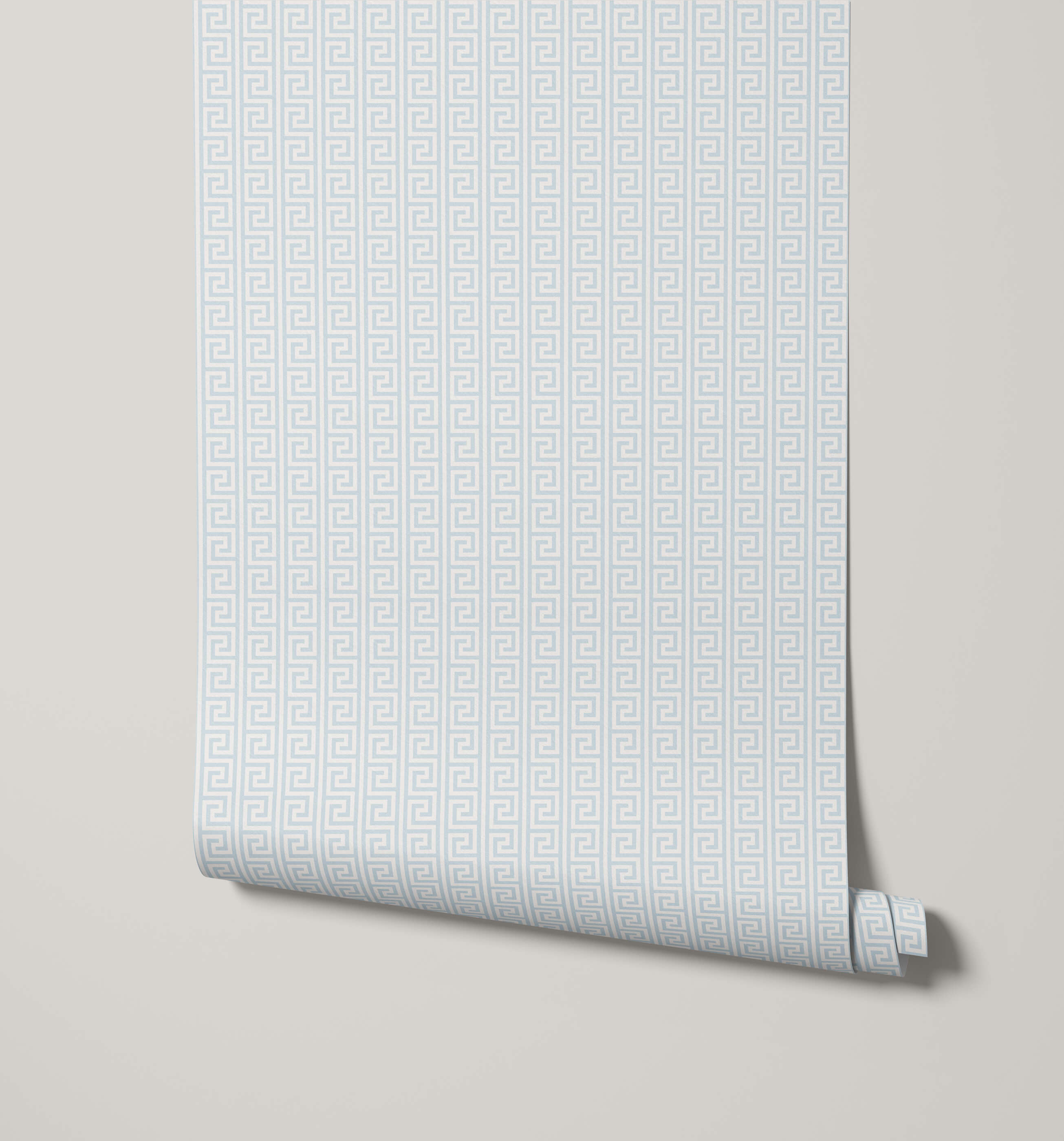 Roll of light blue geometric patterned wallpaper on a beige background