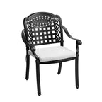 Black metal chair with white cushion on a white background