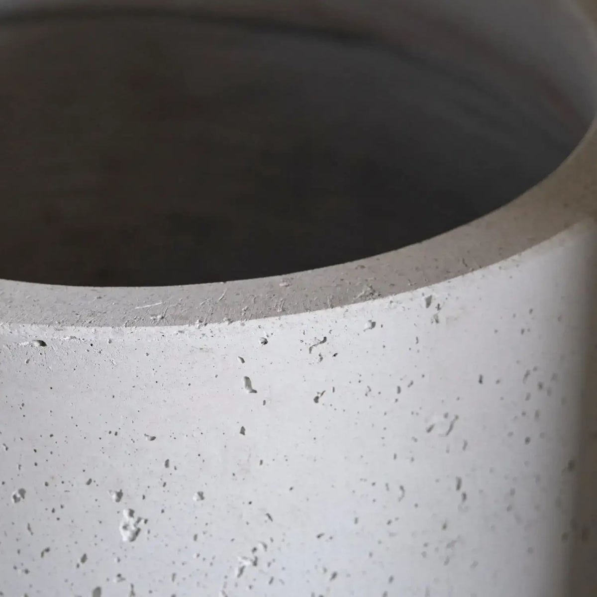 Close-up of a textured concrete pot