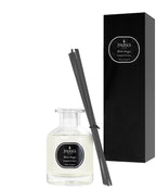 Parks diffuser set with bottle, sticks, and black packaging on a white background
