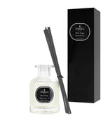 Parks diffuser set with bottle, reeds, and black box on a white background