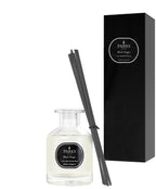 Parks diffuser set with bottle, sticks, and black packaging on a white background