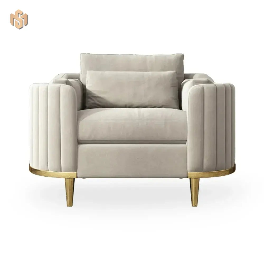 Beige armchair with gold legs on a white background