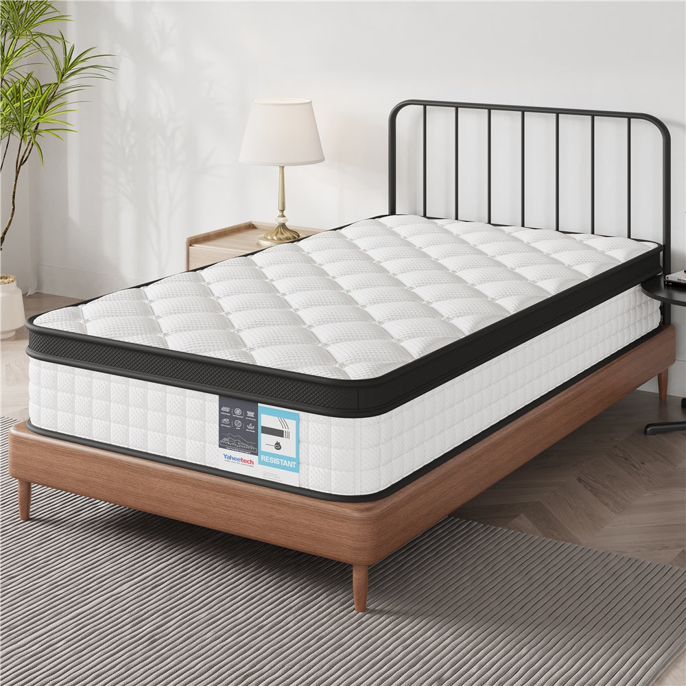 Mattress on a wooden bed frame in a bedroom setting
