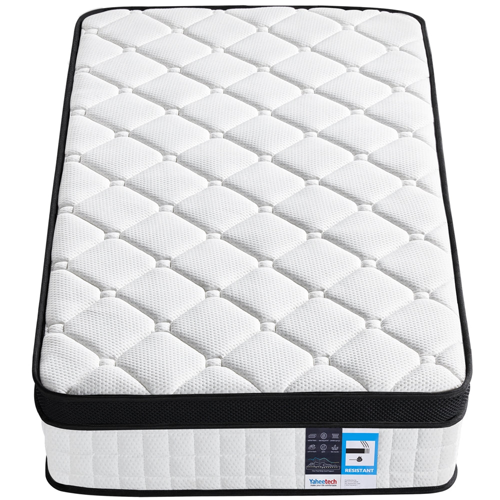 White quilted mattress with black border on a white background