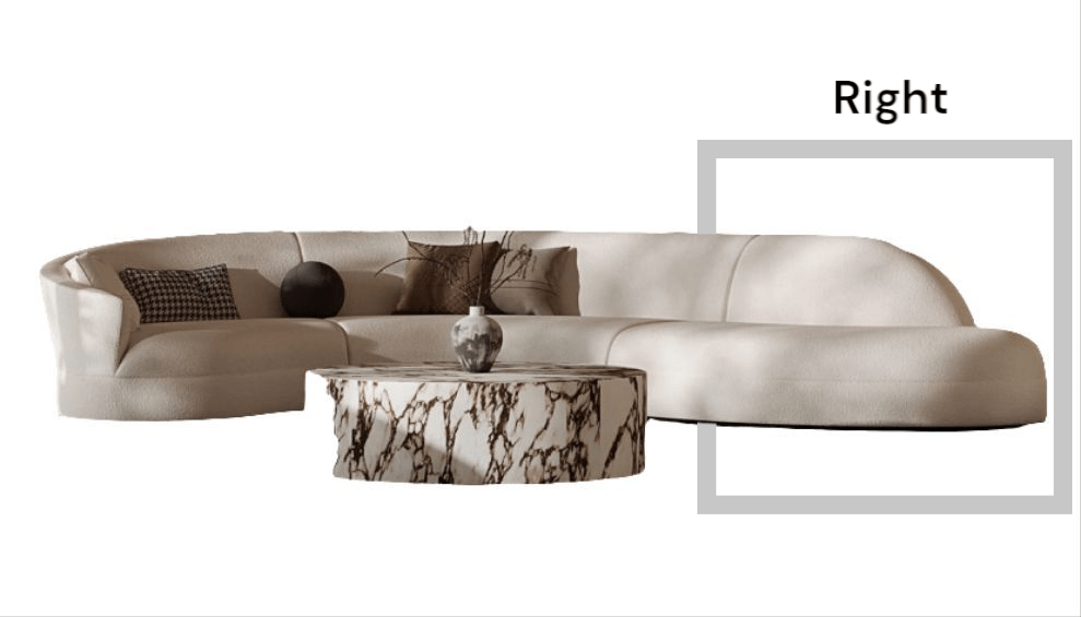 Modern beige sofa with decorative pillows and a marble coffee table on a white background