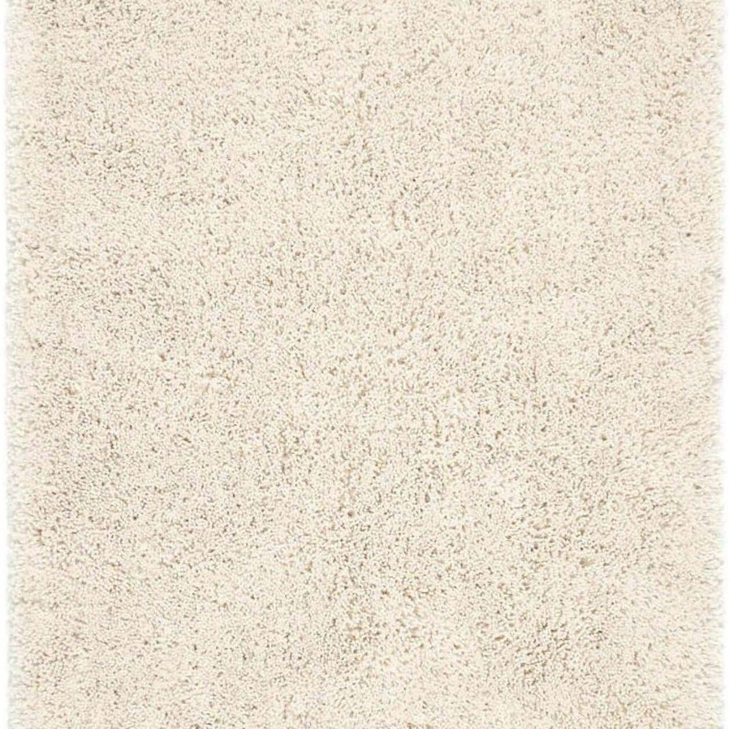 Beige shaggy rug with a textured surface