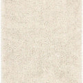 Beige shaggy rug with a textured surface
